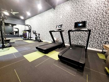 A gym with treadmills